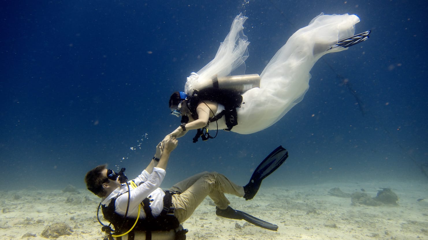 Scuba diving in a wedding dress