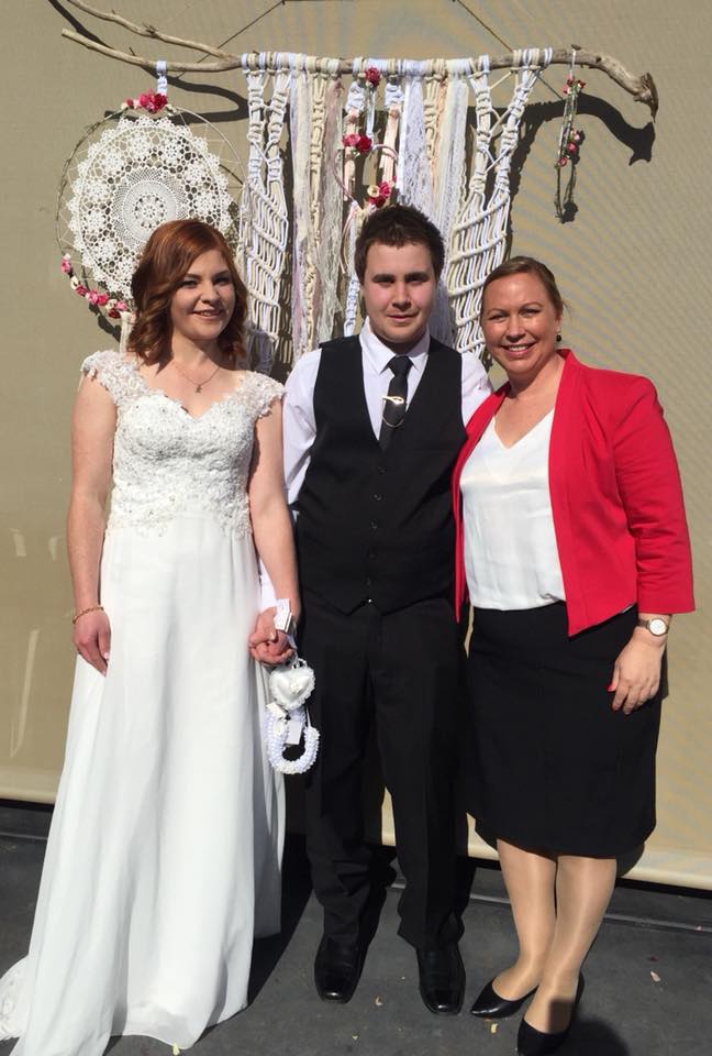 Kim and Andrew Malnai on their wedding day at a private residence